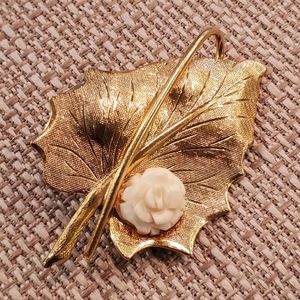 Vintage goldtone leaf brooch with carved rose